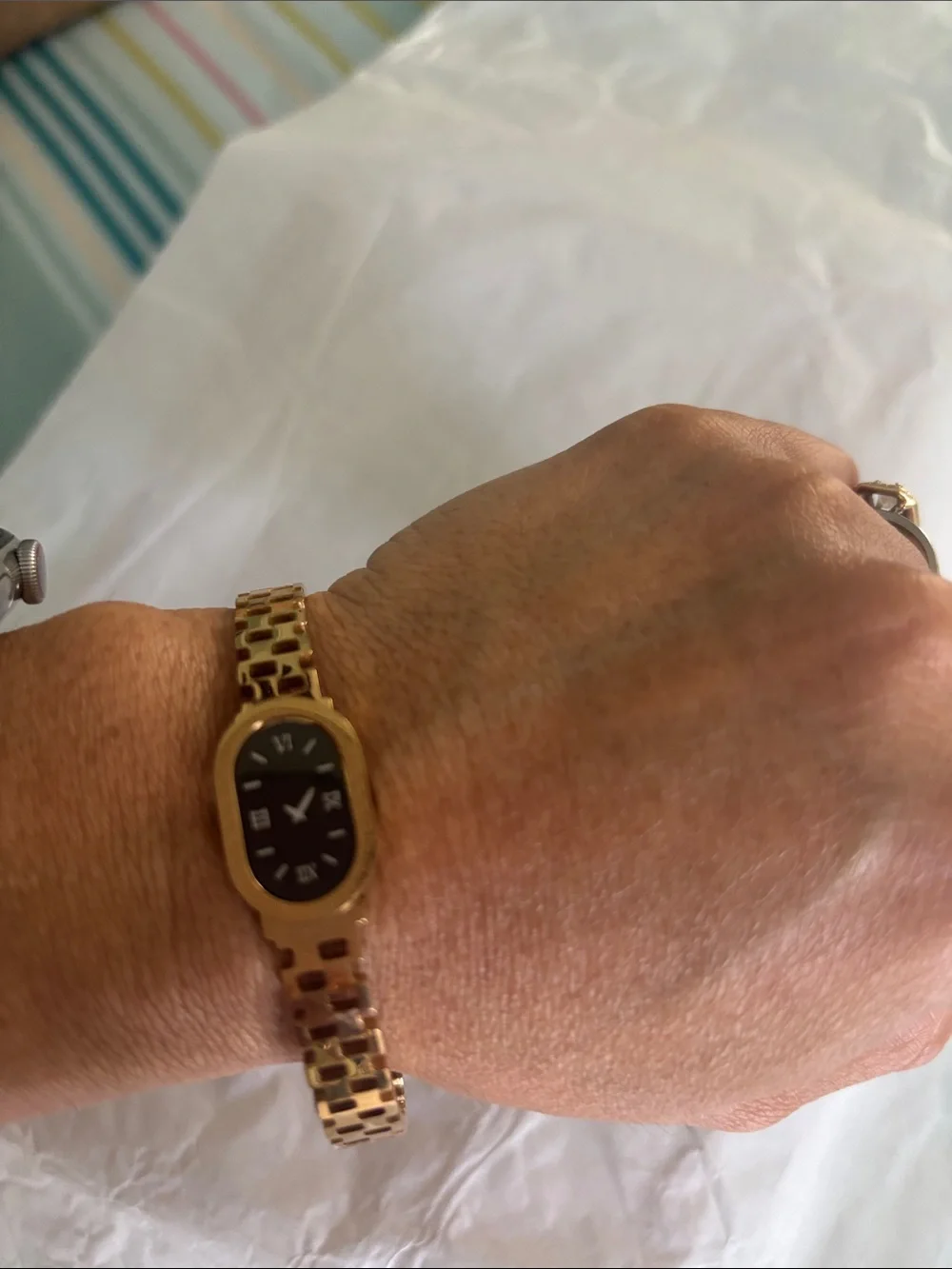 Elegant Women's Gold-Tone Bracelet Watch with Black Dial NOT REAL watch